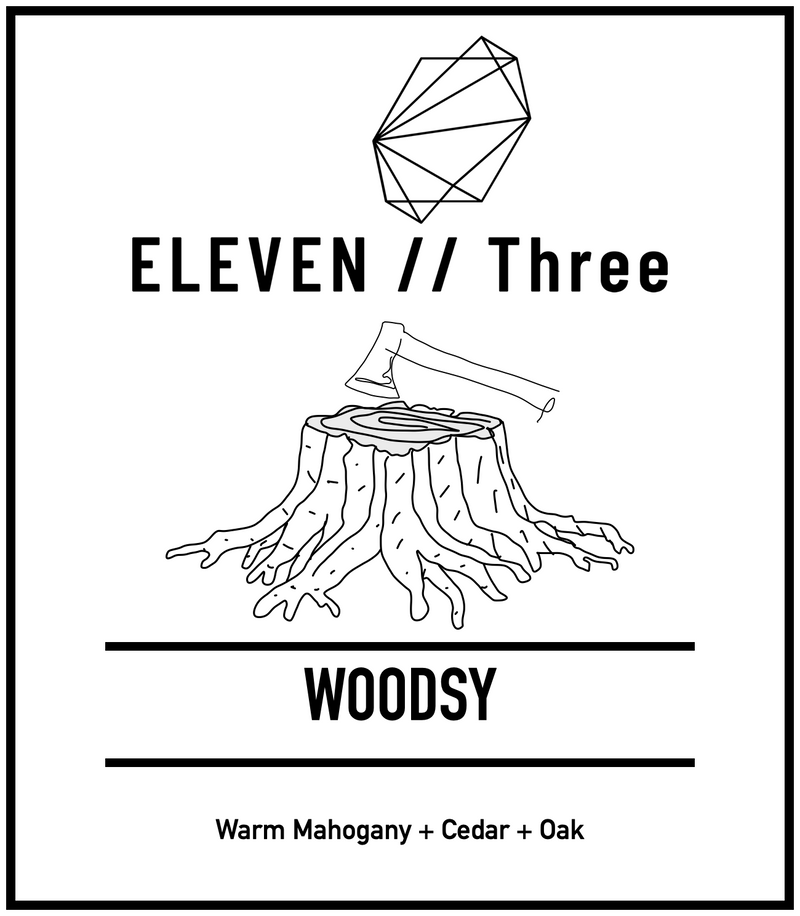 WOODSY soy candle by ELEVEN//Three — warm mahogany, cedar, oak